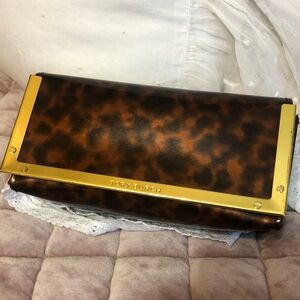 Tory Burch tortoise sunglasses case